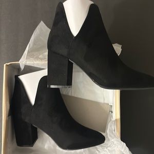 “More to love booties” by YOKI black2 1/2” heel size 9